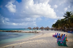 Adirondack chairs near Divi Phoenix Aruba